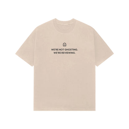 We're Not Ghosting. We're Reviewing. oversized T-shirt in Beige